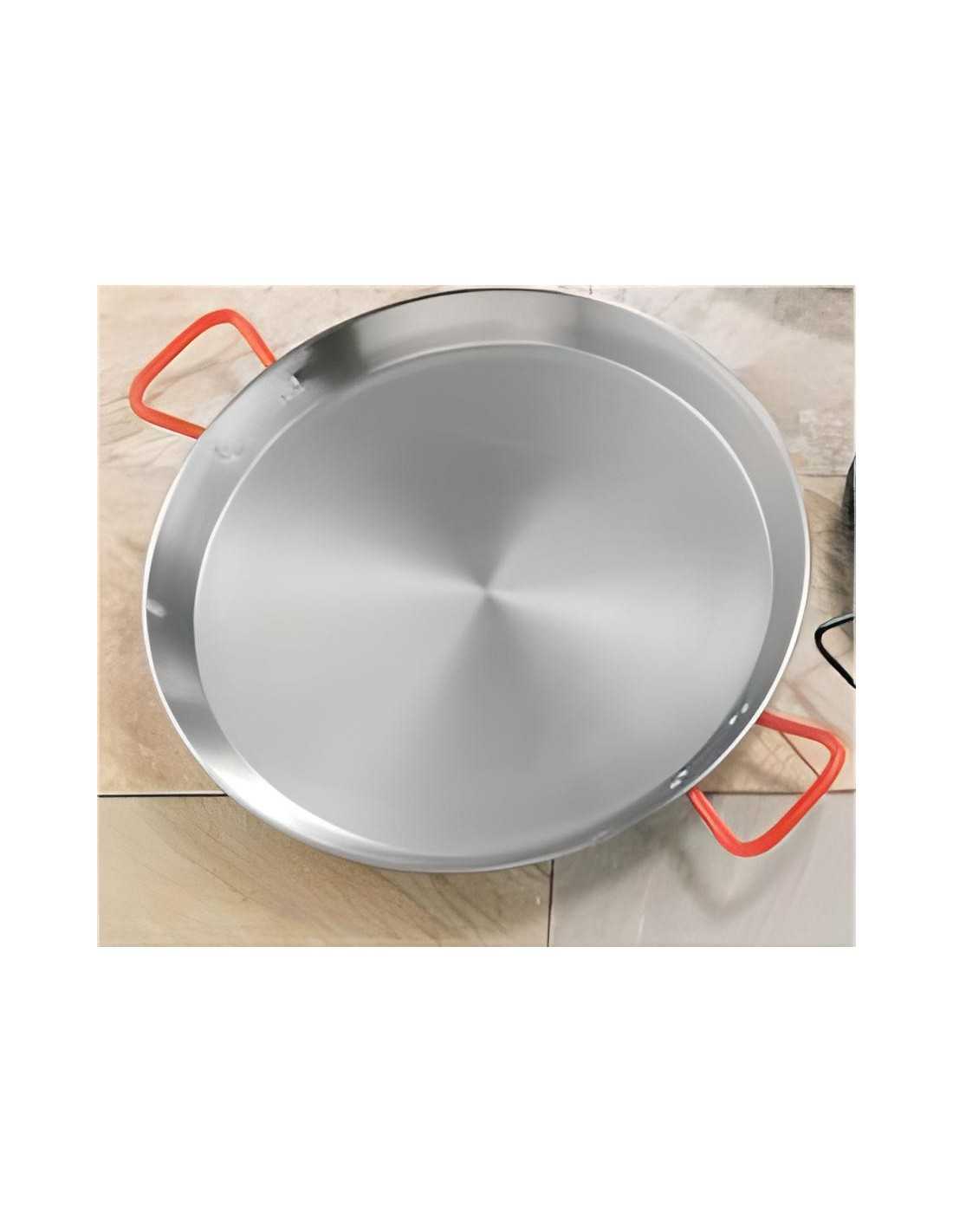Garcima polished steel paella pan 42cm with two red handles.