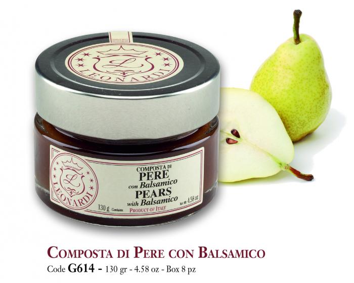 Leonardi pear condiment in a glass jar beside a cut pear