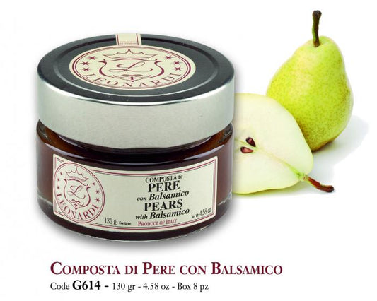 Leonardi pear condiment in a glass jar beside a cut pear