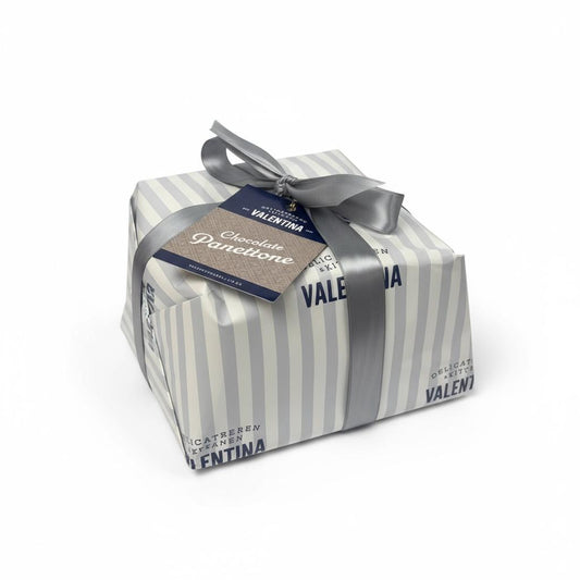 Valentina chocolate panettone wrapped in striped paper with a ribbon on a white background